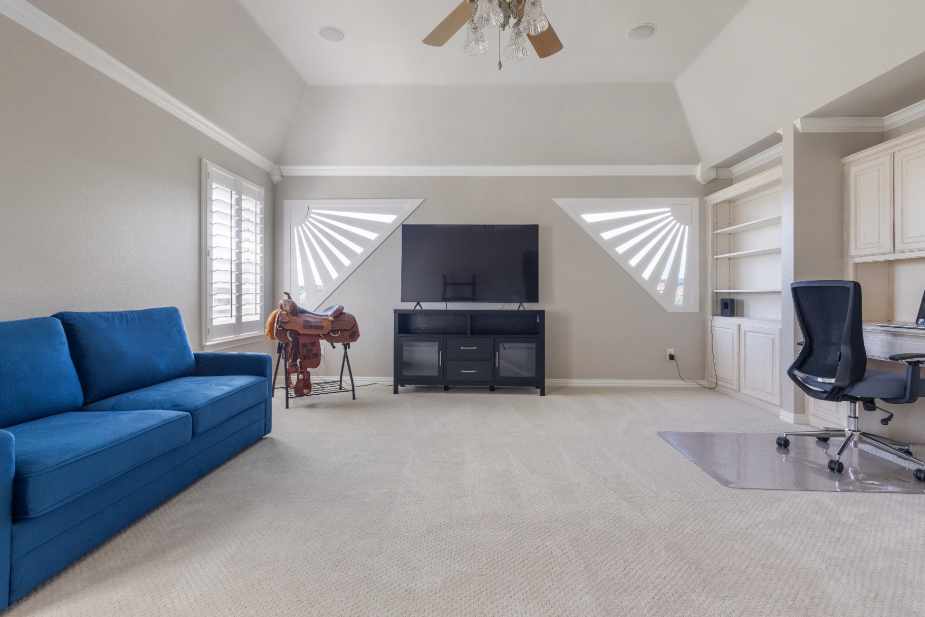 Bonus room with built-in desk and dormers