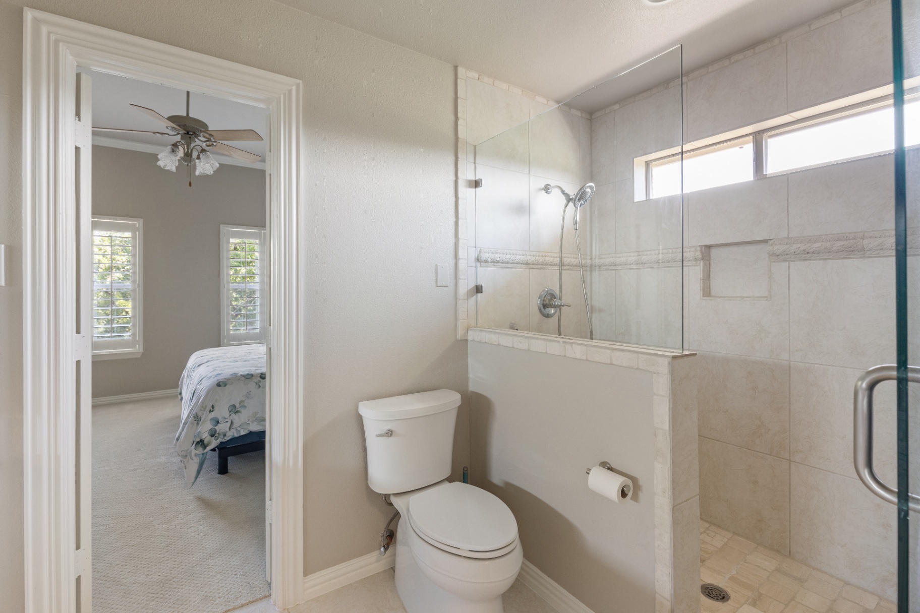 Bedroom-adjoining walk-in shower