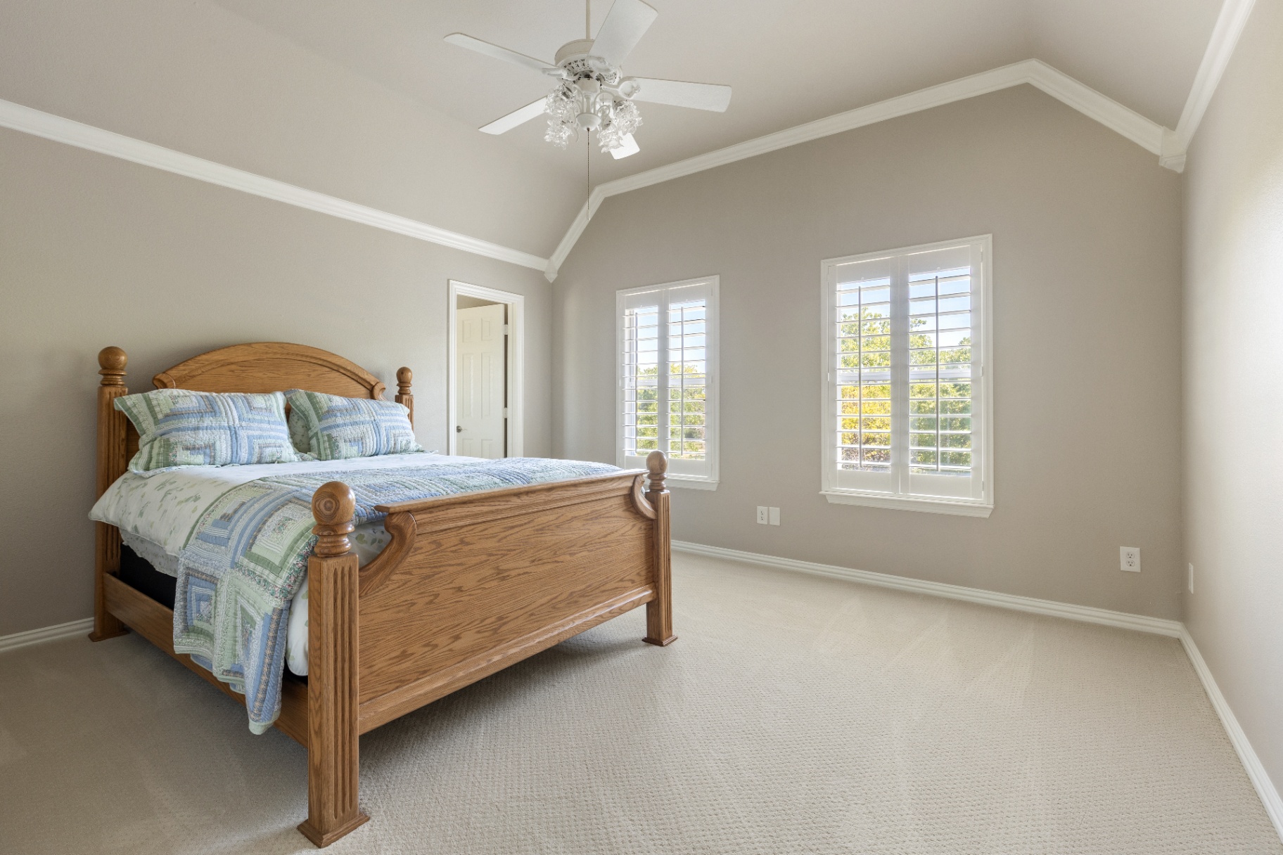 Secondary bedroom with vaulted ceiling