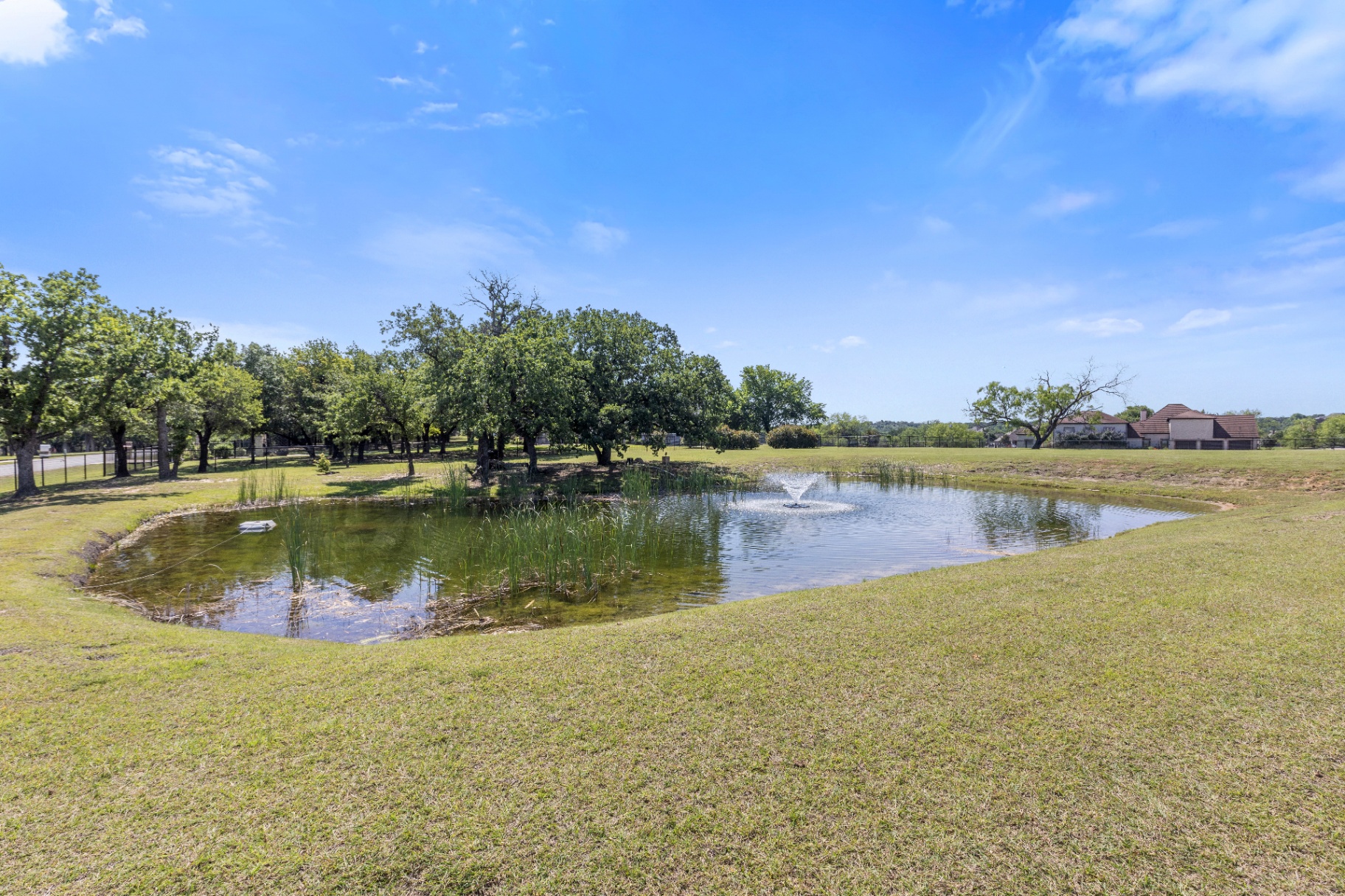 On-property pond with aerating fountain